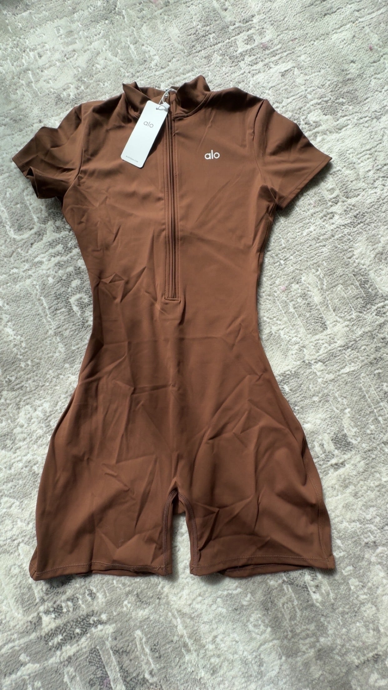 Sculpting alo Yoga Zip Up One-Piece for Women | Neutral Luxe Loungewear Short Sleeved Solid Color Spandex Snatched Fit