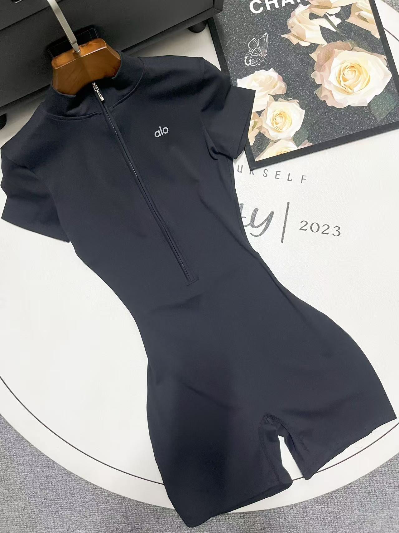 Sculpting alo Yoga Zip Up One-Piece for Women | Neutral Luxe Loungewear Short Sleeved Solid Color Spandex Snatched Fit